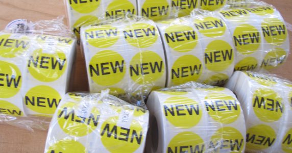 Rolls of yellow sticker labels